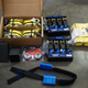 Large and small ratchet straps, wheel tie-down loops, locks, and chocks.